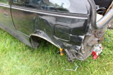 Left rear view damage.JPG